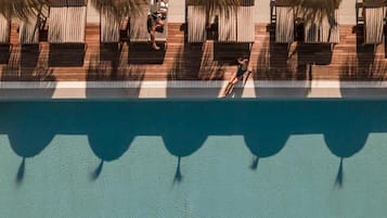 Outdoor pool, open 10 AM to 6 PM, pool umbrellas, sun loungers