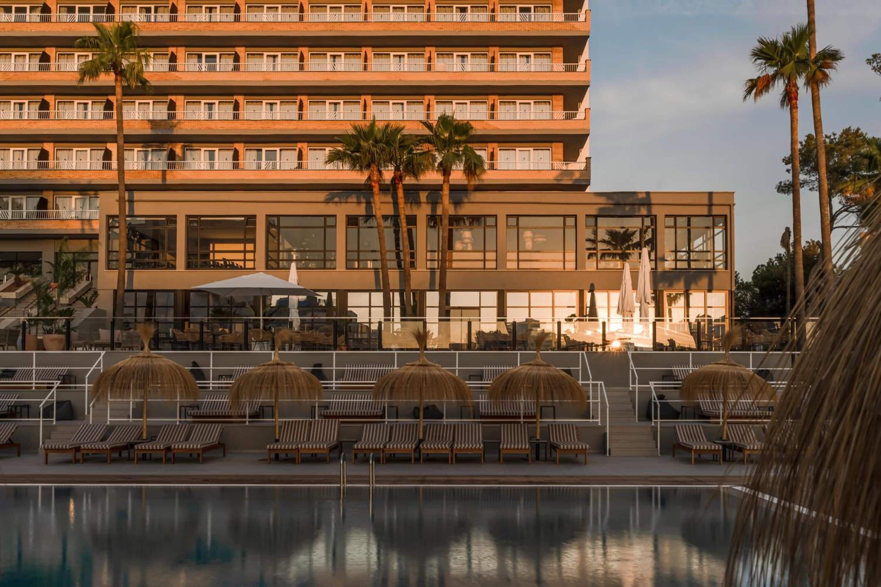 Outdoor pool, open 10 AM to 6 PM, pool umbrellas, sun loungers