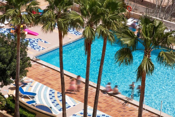 Outdoor pool, open 10 AM to 6 PM, pool umbrellas, sun loungers