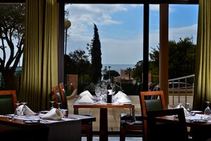 Breakfast, lunch, dinner served; local cuisine 