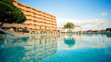 Indoor pool, outdoor pool, pool umbrellas