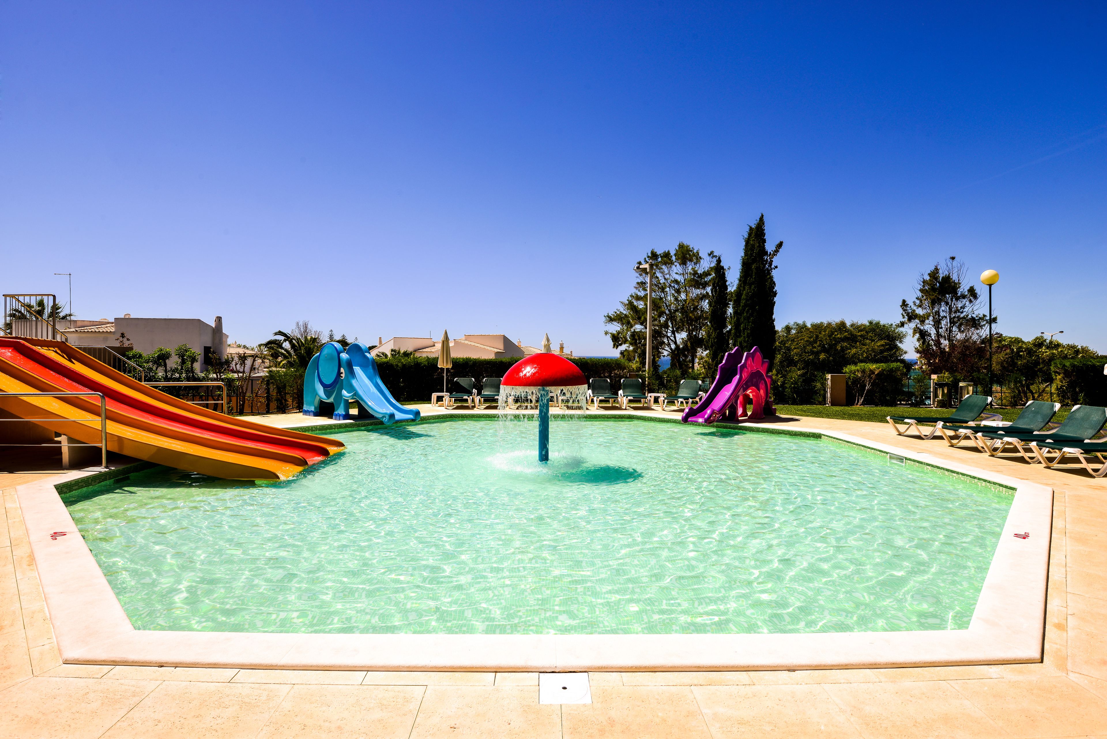 Indoor pool, outdoor pool, pool umbrellas