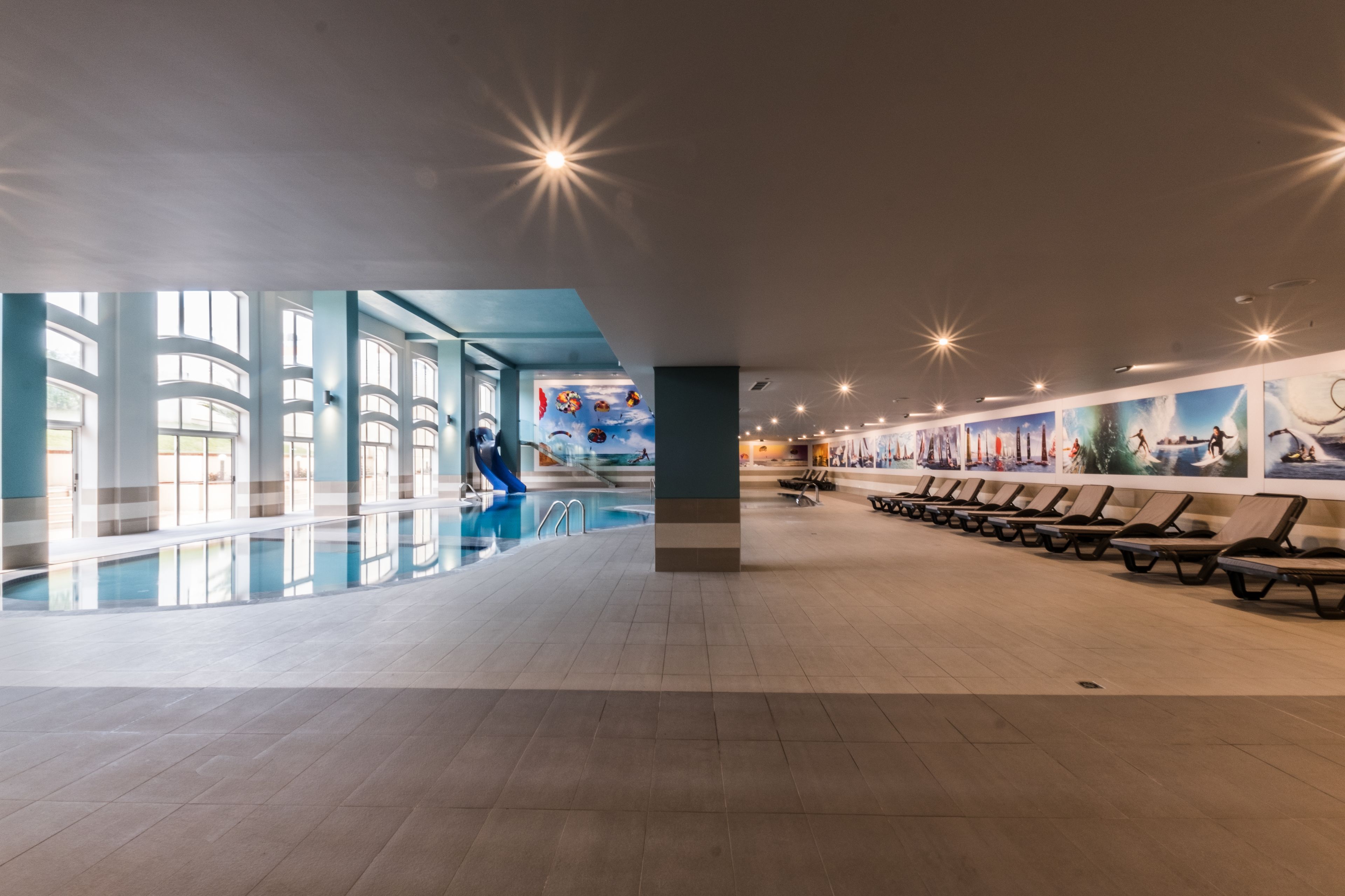 Indoor pool, outdoor pool, pool umbrellas