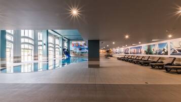 Indoor pool, outdoor pool, pool umbrellas