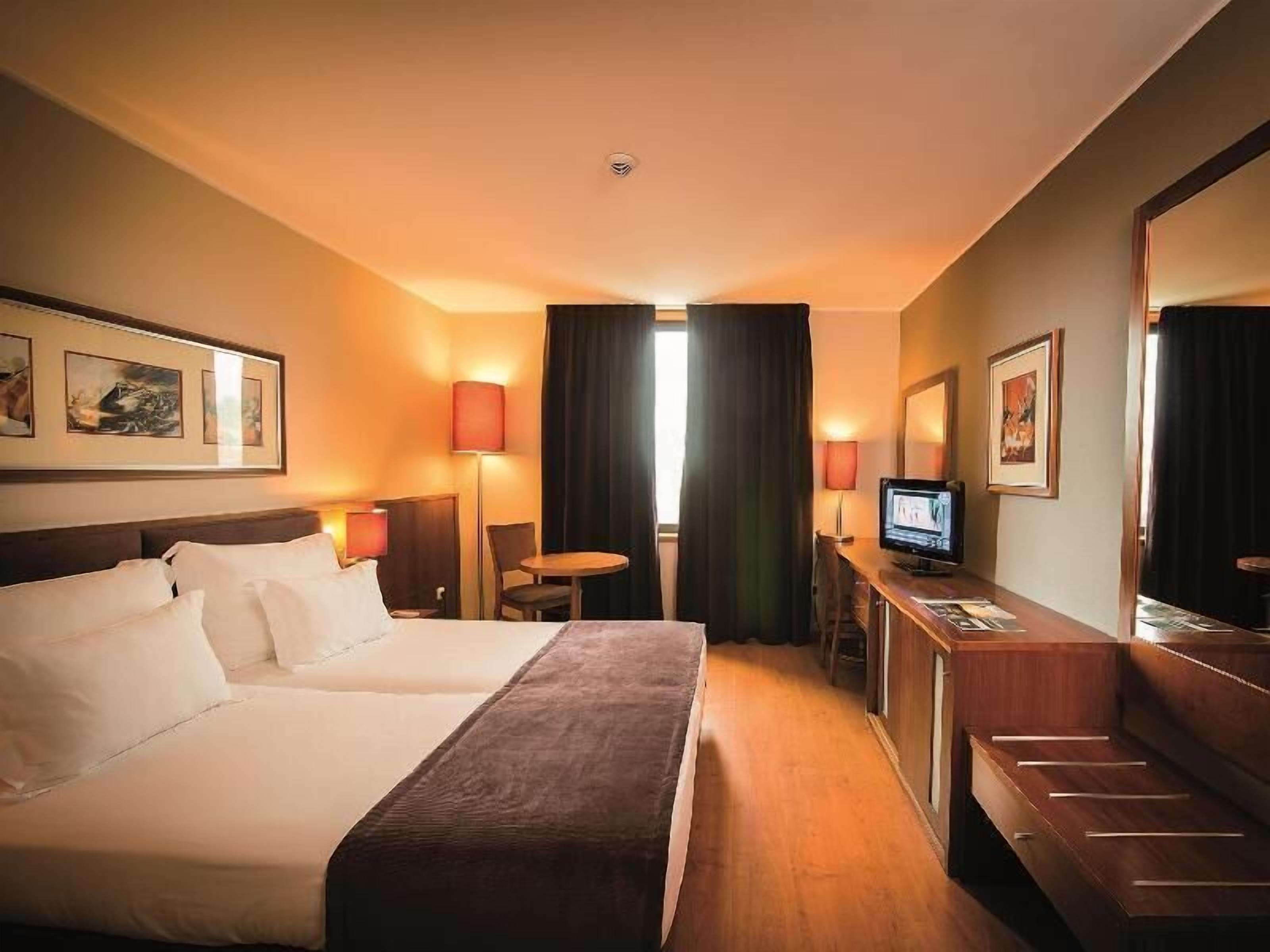 Minibar, desk, blackout curtains, soundproofing