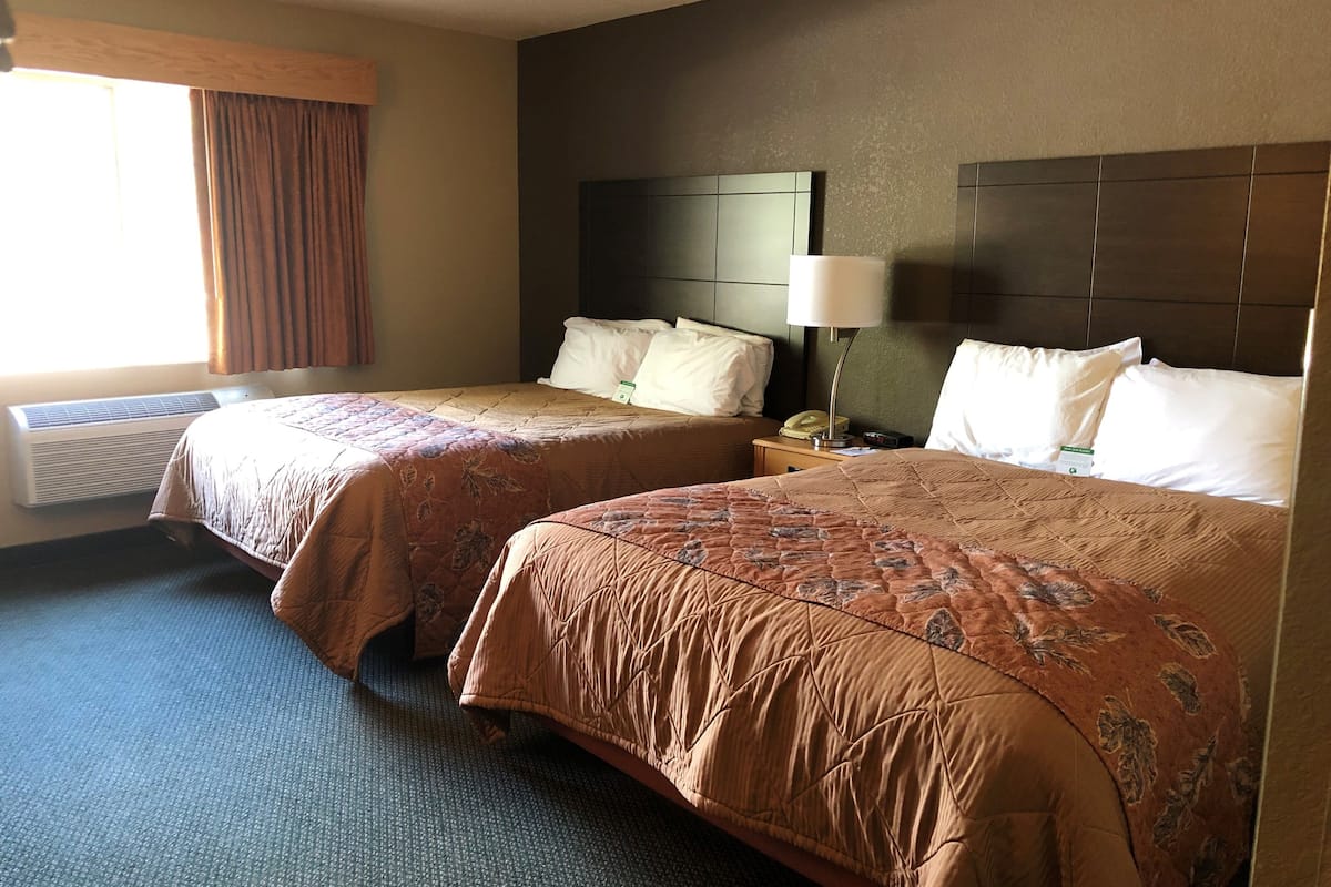 desk, laptop workspace, iron/ironing board, cots/infant beds