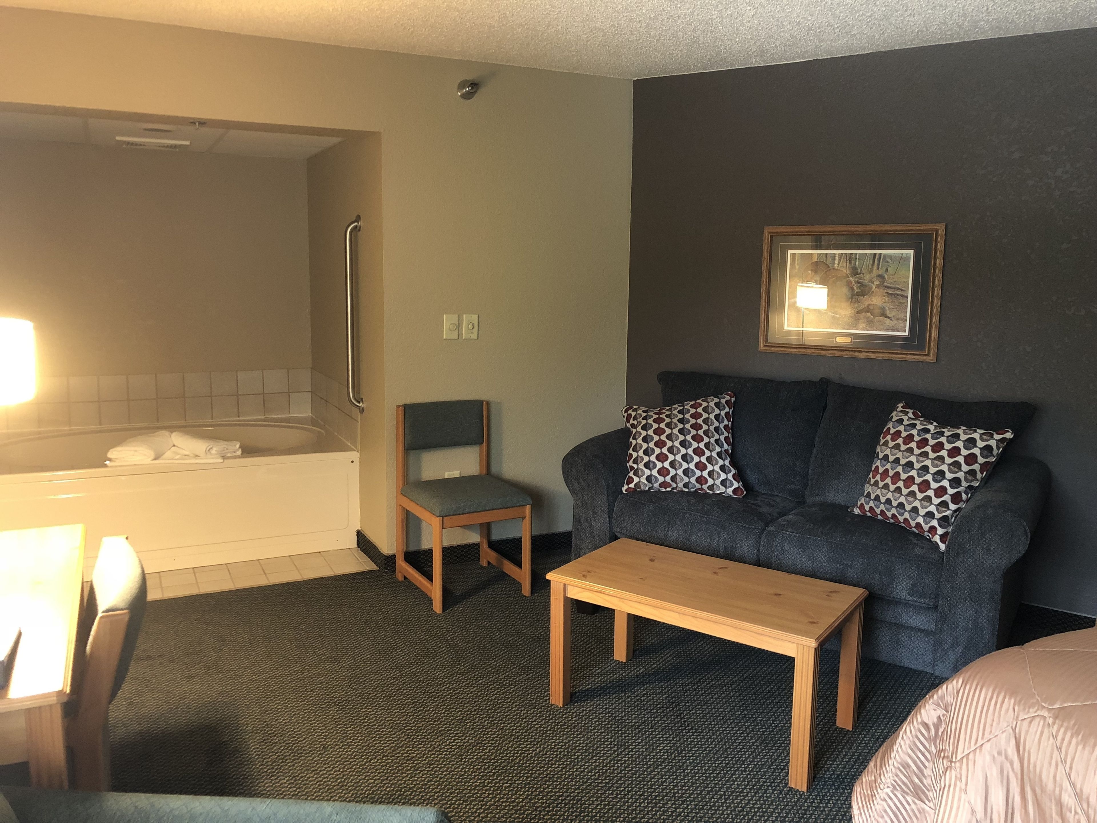 grand suite, 1 king bed, non smoking | desk, laptop workspace, iron/ironing board, cots/infant beds