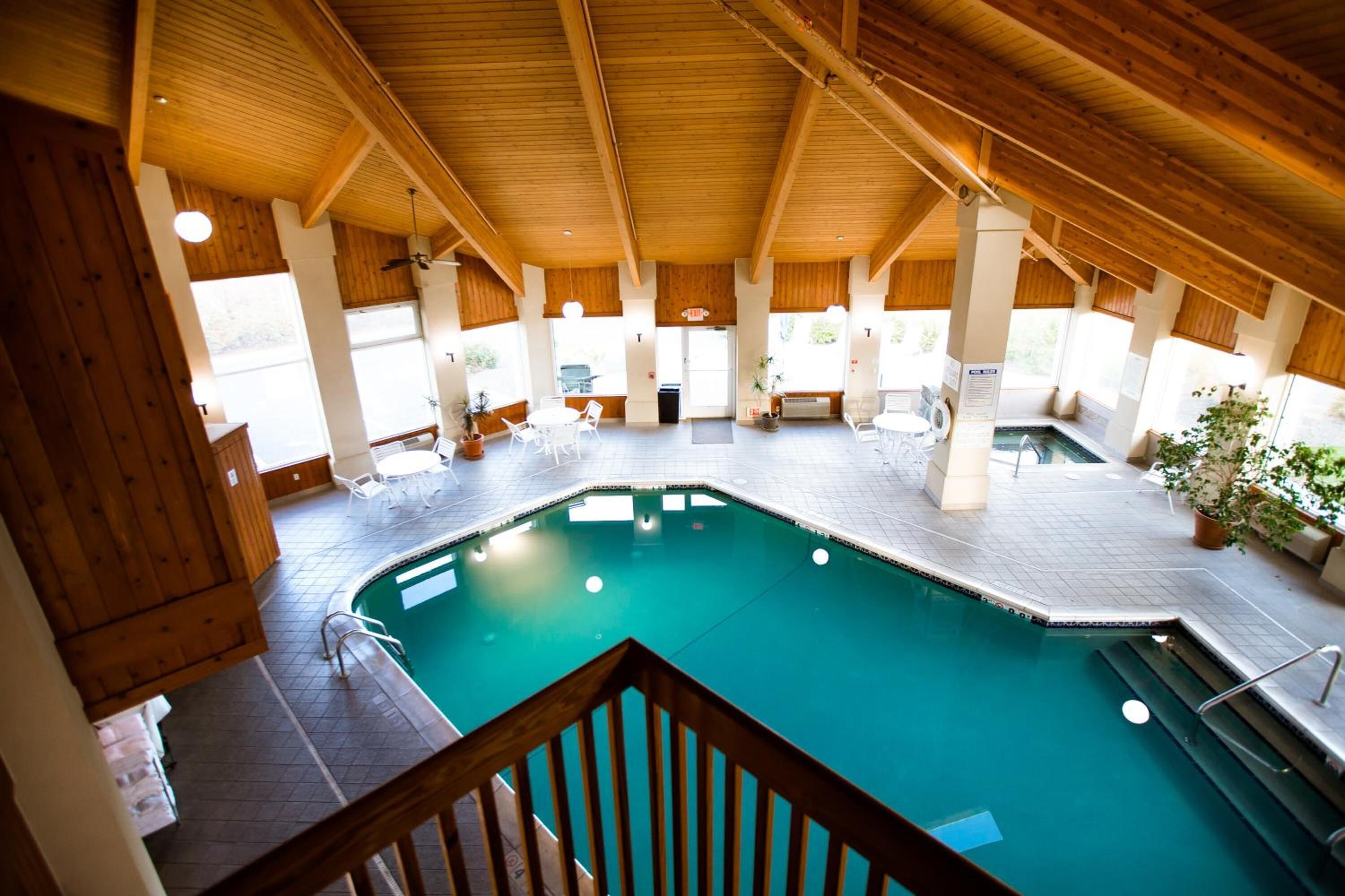 indoor pool, open 8:00 am to 10:00 pm, pool loungers