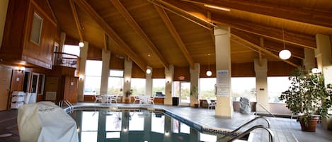 Indoor pool, open 8:00 AM to 10:00 PM, pool loungers