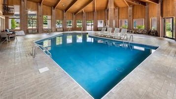Indoor pool, open 9:00 AM to 10:00 PM, pool loungers