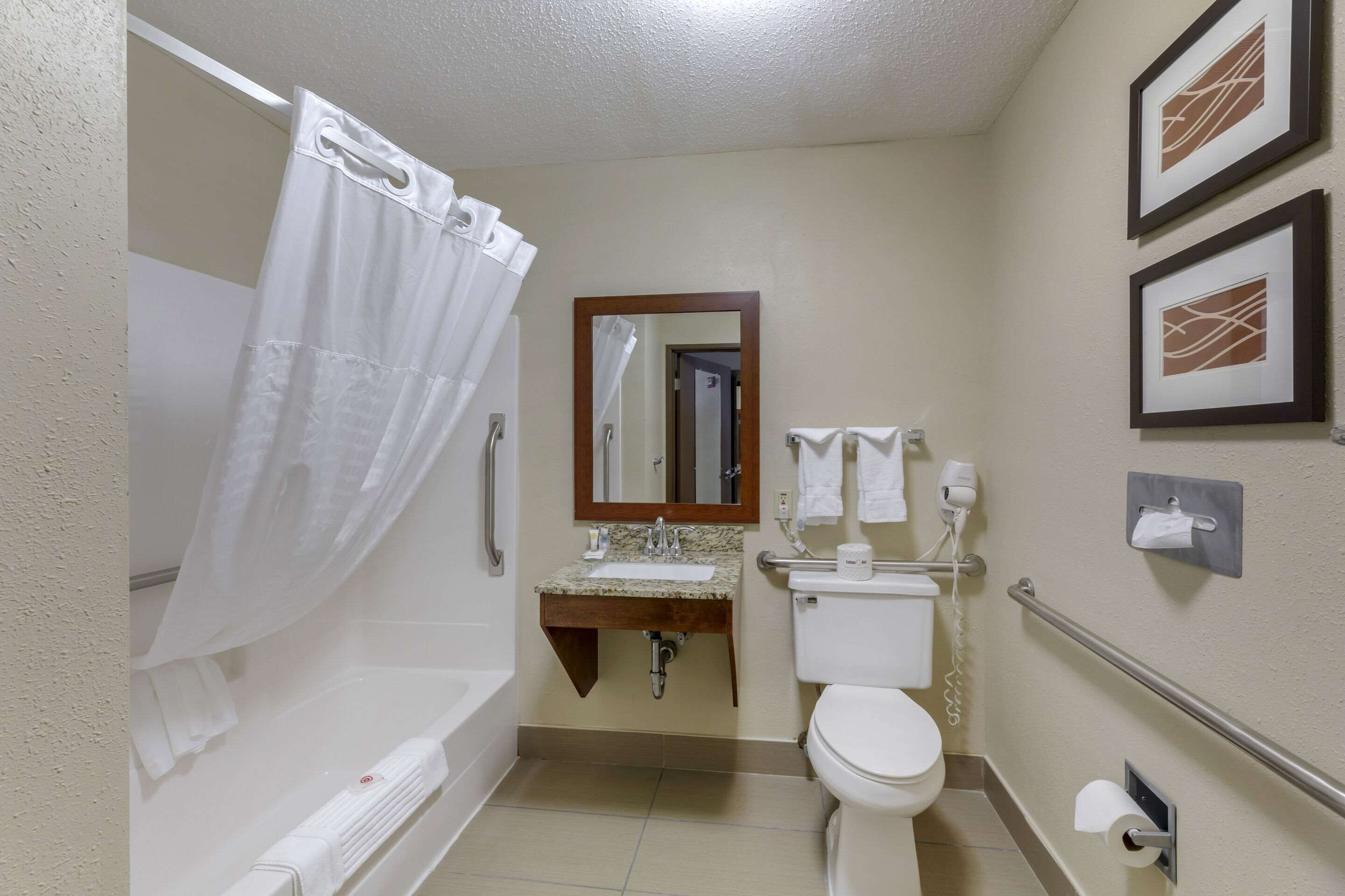 premium bedding, desk, laptop workspace, blackout curtains