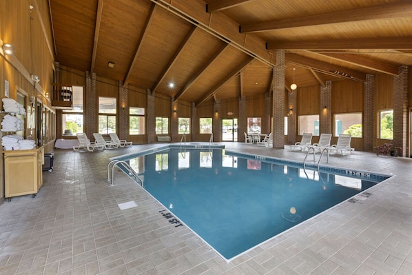 Indoor pool, open 9:00 AM to 10:00 PM, pool loungers