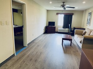 Presidential Studio Suite, 1 King Bed | 1 bedroom, desk, iron/ironing board, free WiFi