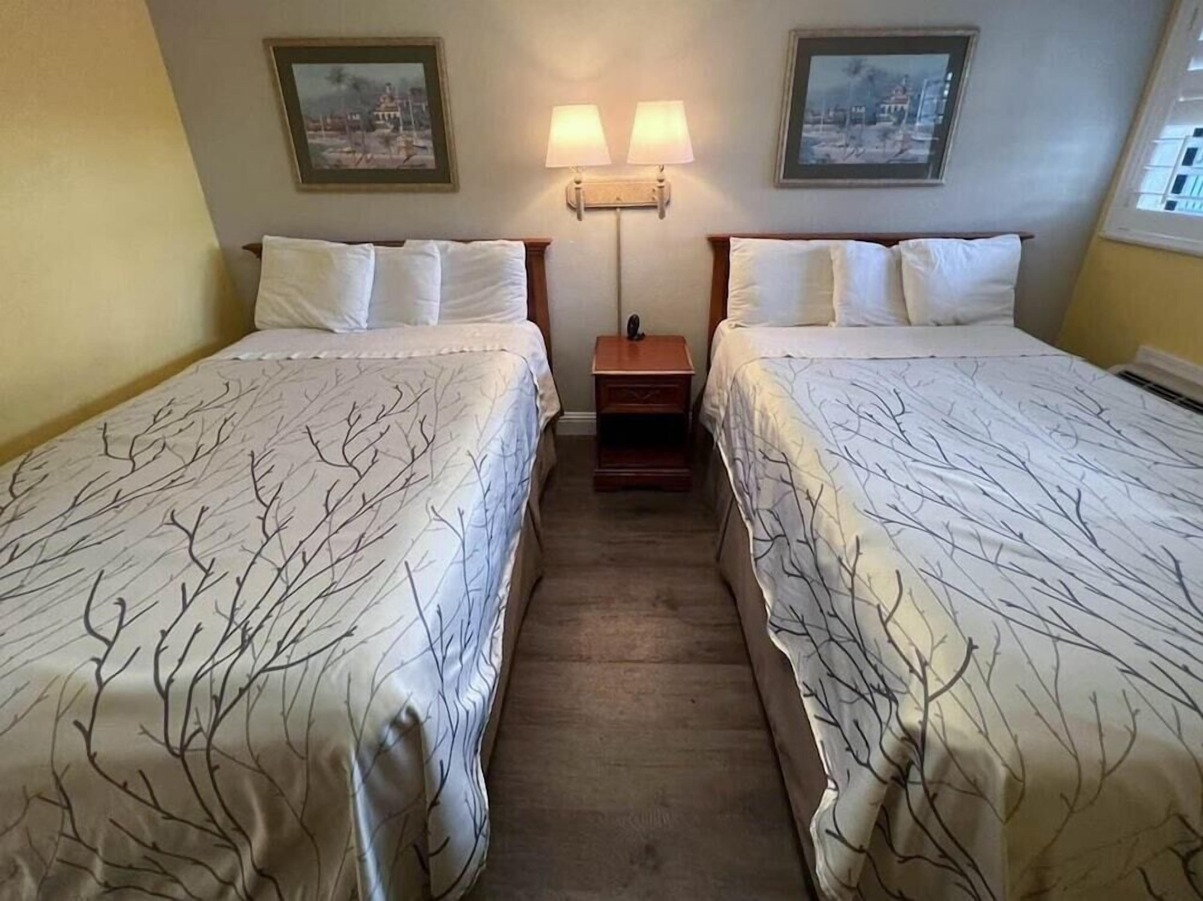 Blackout drapes, WiFi (free), alarm clocks, bed sheets