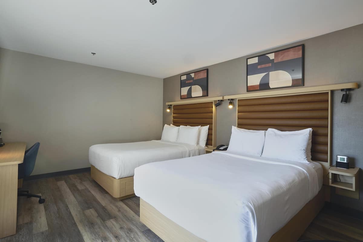 Deluxe Room, 2 Double Beds, Non Smoking | Blackout curtains, iron/ironing board, free cots/infant beds, free WiFi