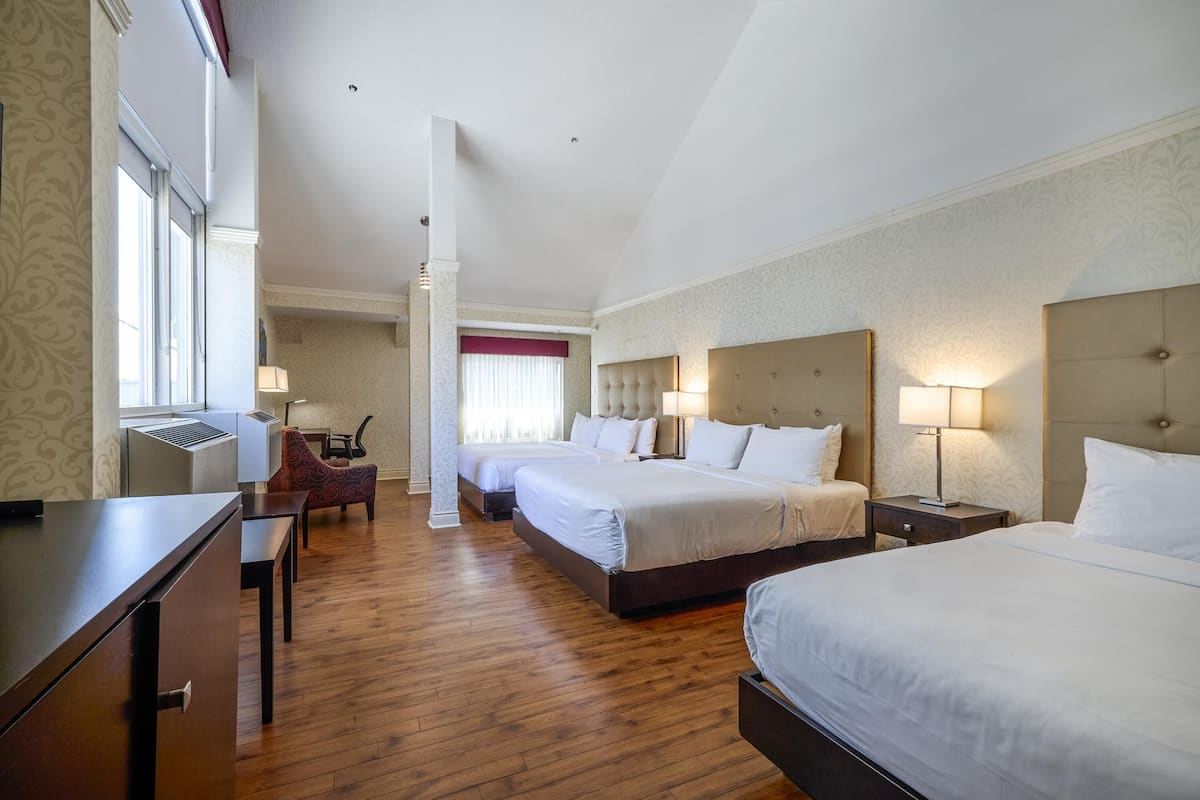 Family Suite, Multiple Beds, Non Smoking (Larger Room) | Blackout curtains, iron/ironing board, free cots/infant beds, free WiFi