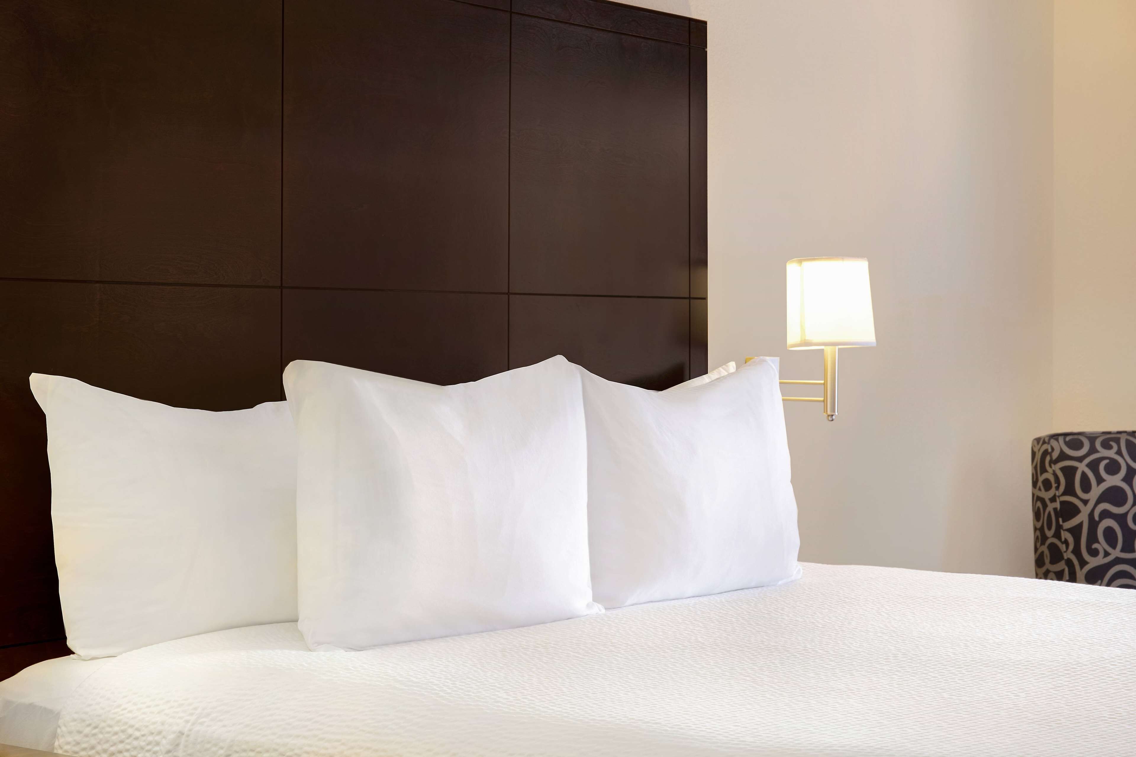 classic 1 king bed room | premium bedding, desk, blackout curtains, iron/ironing board