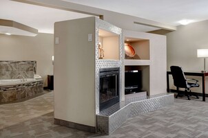 Signature King Suite Fireplace, Jetted Tub & Sofa Bed | Premium bedding, desk, blackout drapes, iron/ironing board