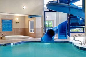 Indoor pool, open 9 AM to 10 PM, pool loungers