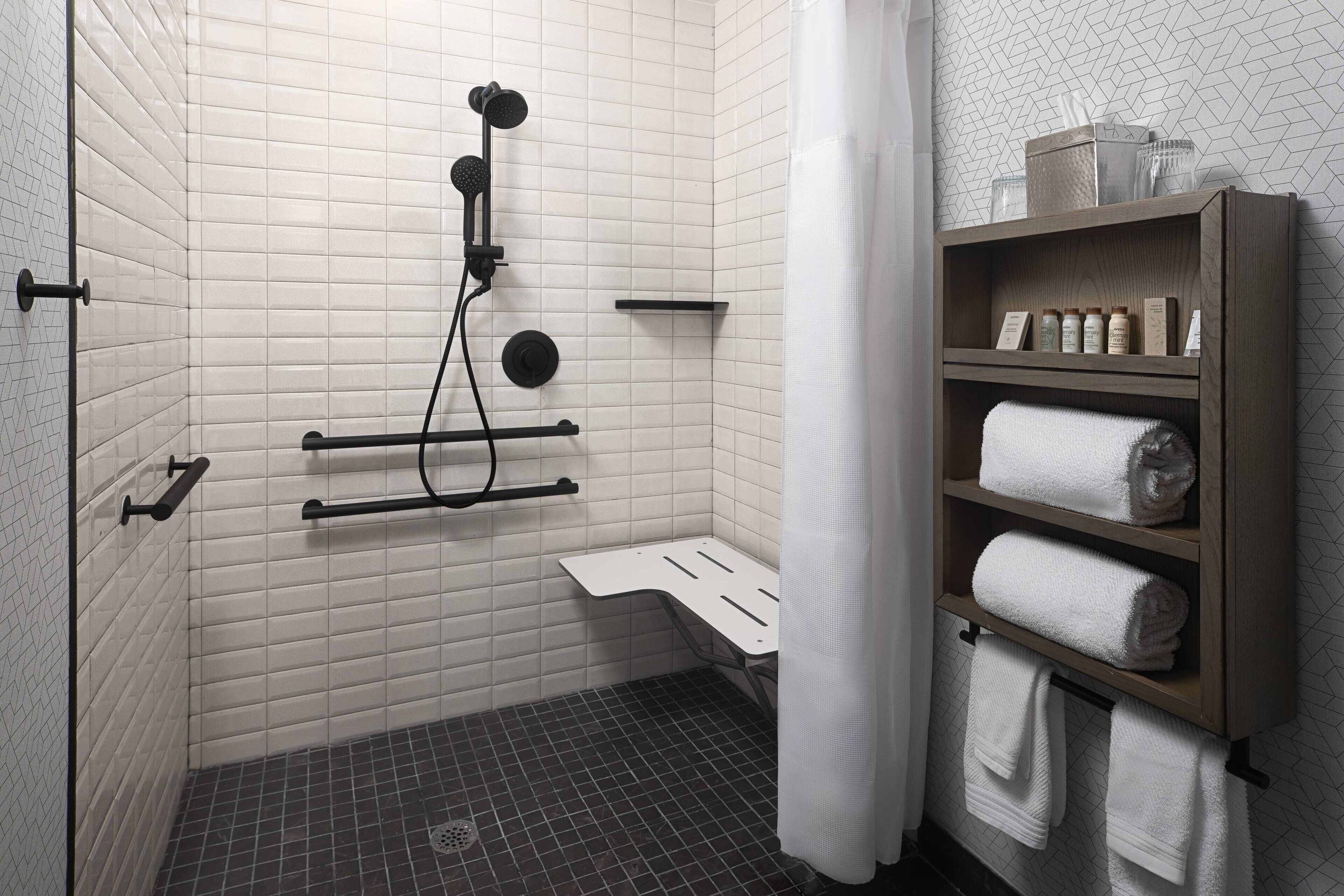 room, 1 king bed (mobility accessible, roll-in shower) | bathroom | combined shower/bathtub, designer toiletries, hair dryer, bathrobes