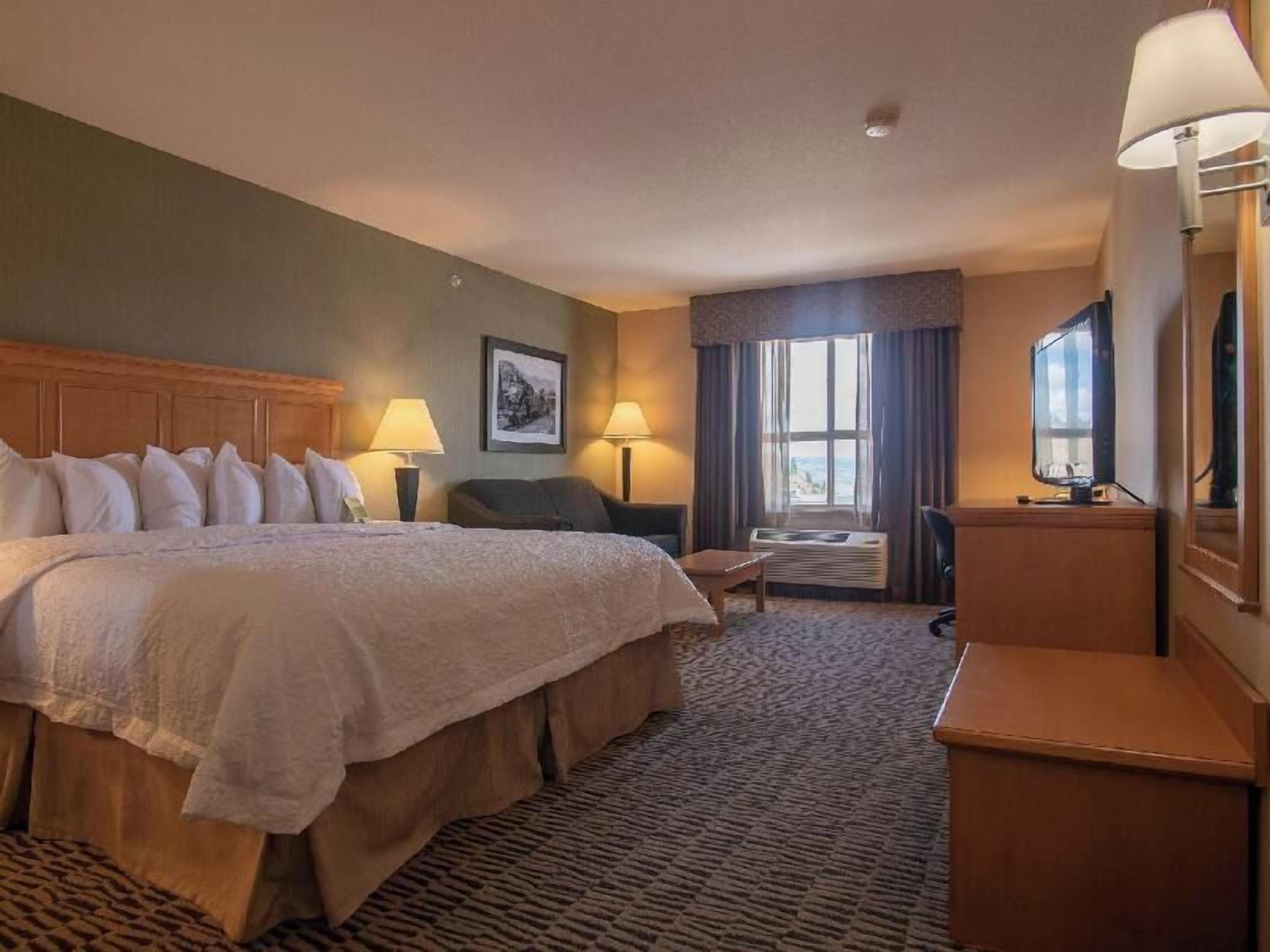 Pillow-top beds, desk, laptop workspace, blackout curtains