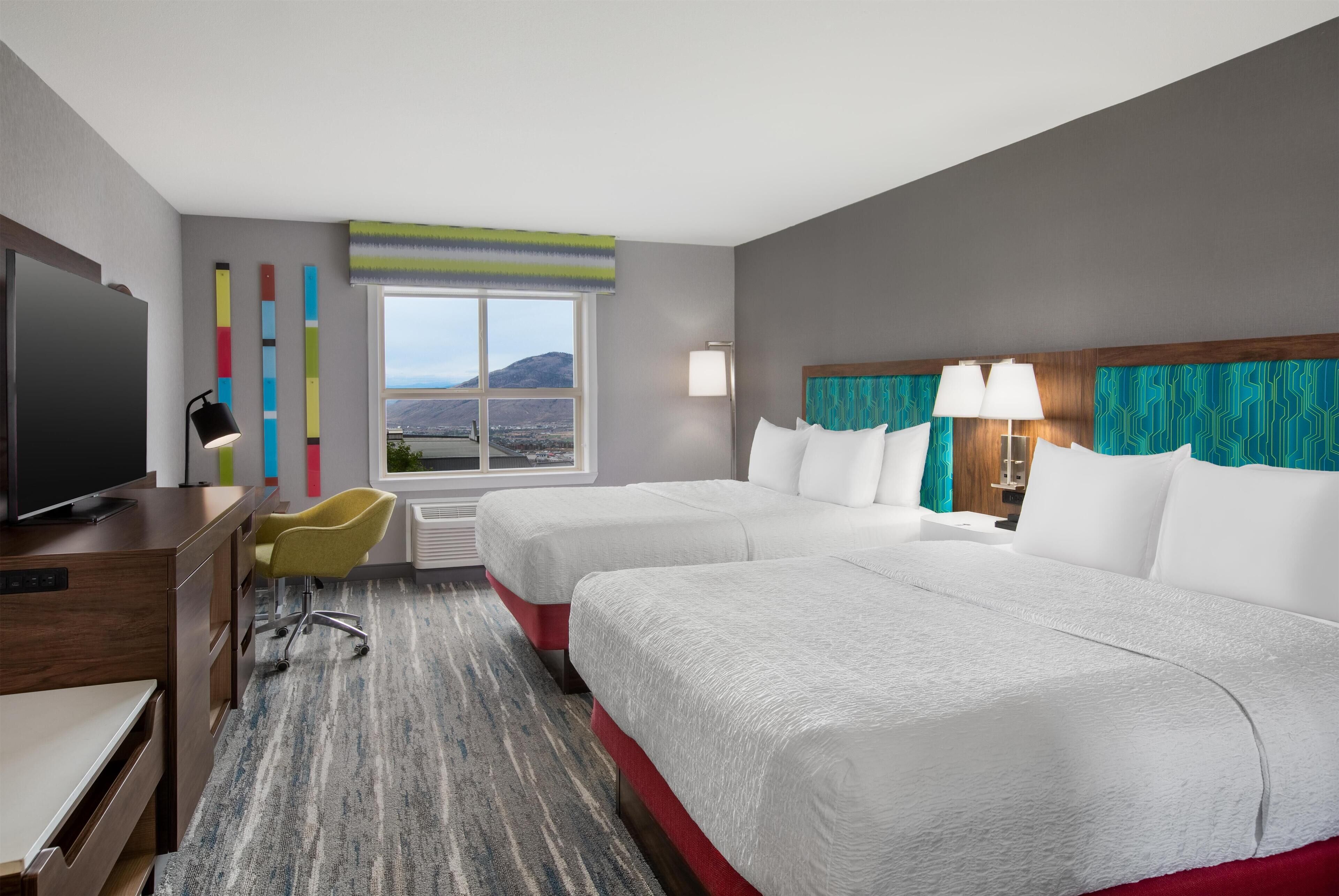 Pillowtop beds, desk, laptop workspace, blackout drapes