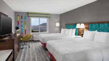 Camas con pillow-top, escritorio y espacio para trabajar con laptop