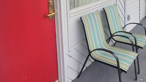 A red door with a brass doorbell and a number plate marked "262". - 7 Nights Stay (Niagara Falls)