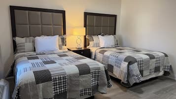 Room, 2 Double Beds | Desk, soundproofing, iron/ironing board, free WiFi