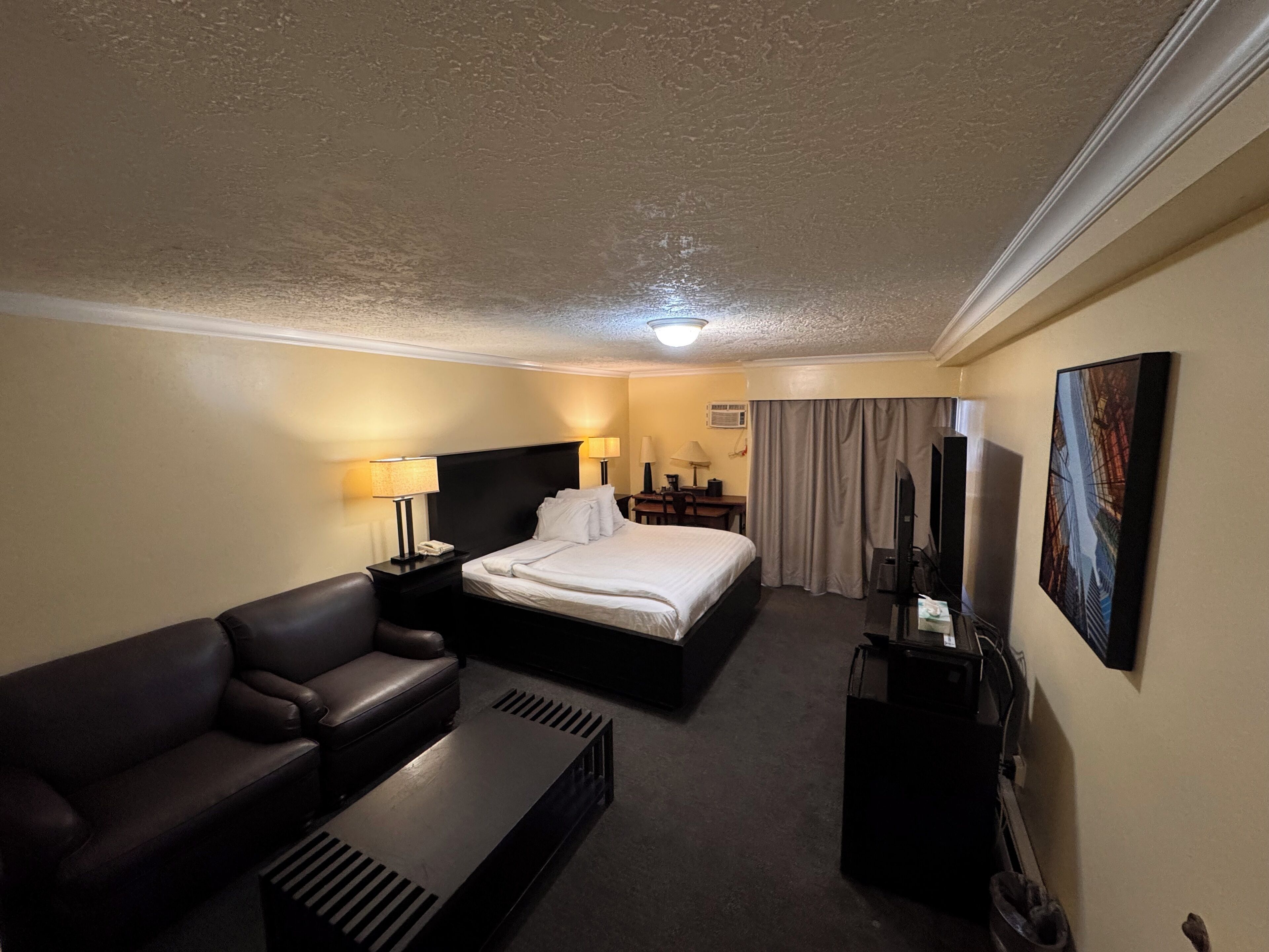 Standard Room, 1 King Bed | Desk, blackout drapes, iron/ironing board, free WiFi