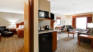 Premium bedding, pillow-top beds, desk, laptop workspace