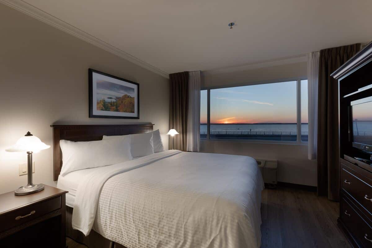 superior room, 1 king bed, river view | premium bedding, desk, laptop workspace, blackout curtains