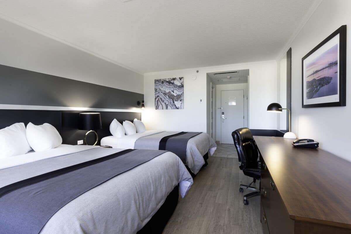 standard room, 2 queen beds | premium bedding, desk, laptop workspace, blackout curtains