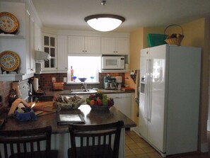 Apartment, 2 Bedrooms | Private kitchen | Full-size fridge, microwave, stovetop, dishwasher