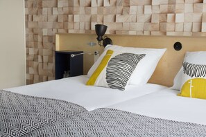 Chambre Confort | Literie de qualité supérieure, coffres-forts dans les chambres, bureau