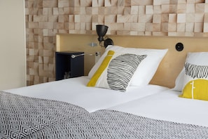 Chambre Confort | Literie de qualité supérieure, coffres-forts dans les chambres, bureau