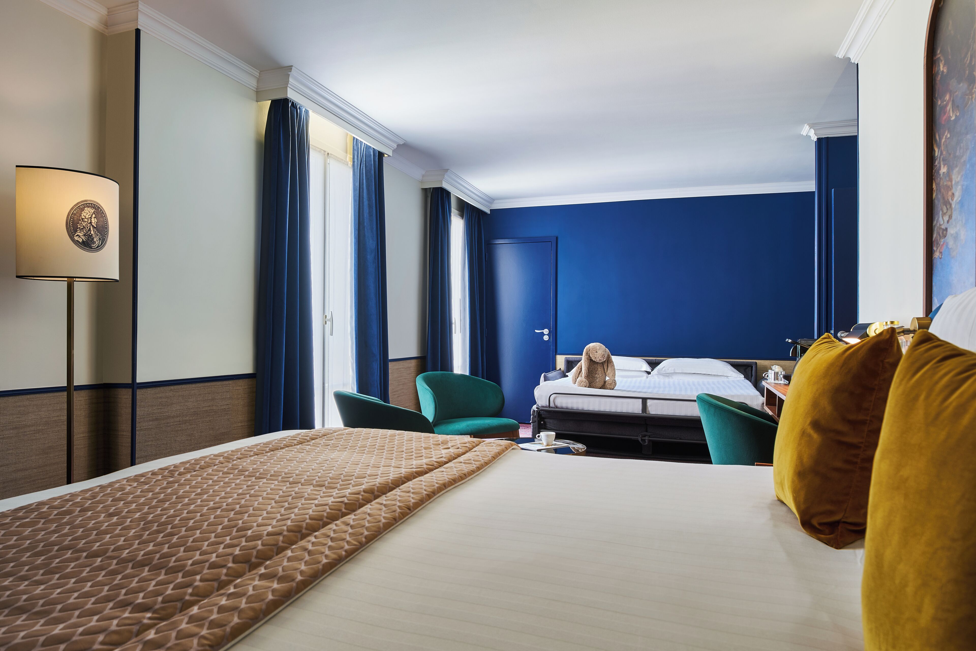 family room | premium bedding, in-room safe, desk, iron/ironing board