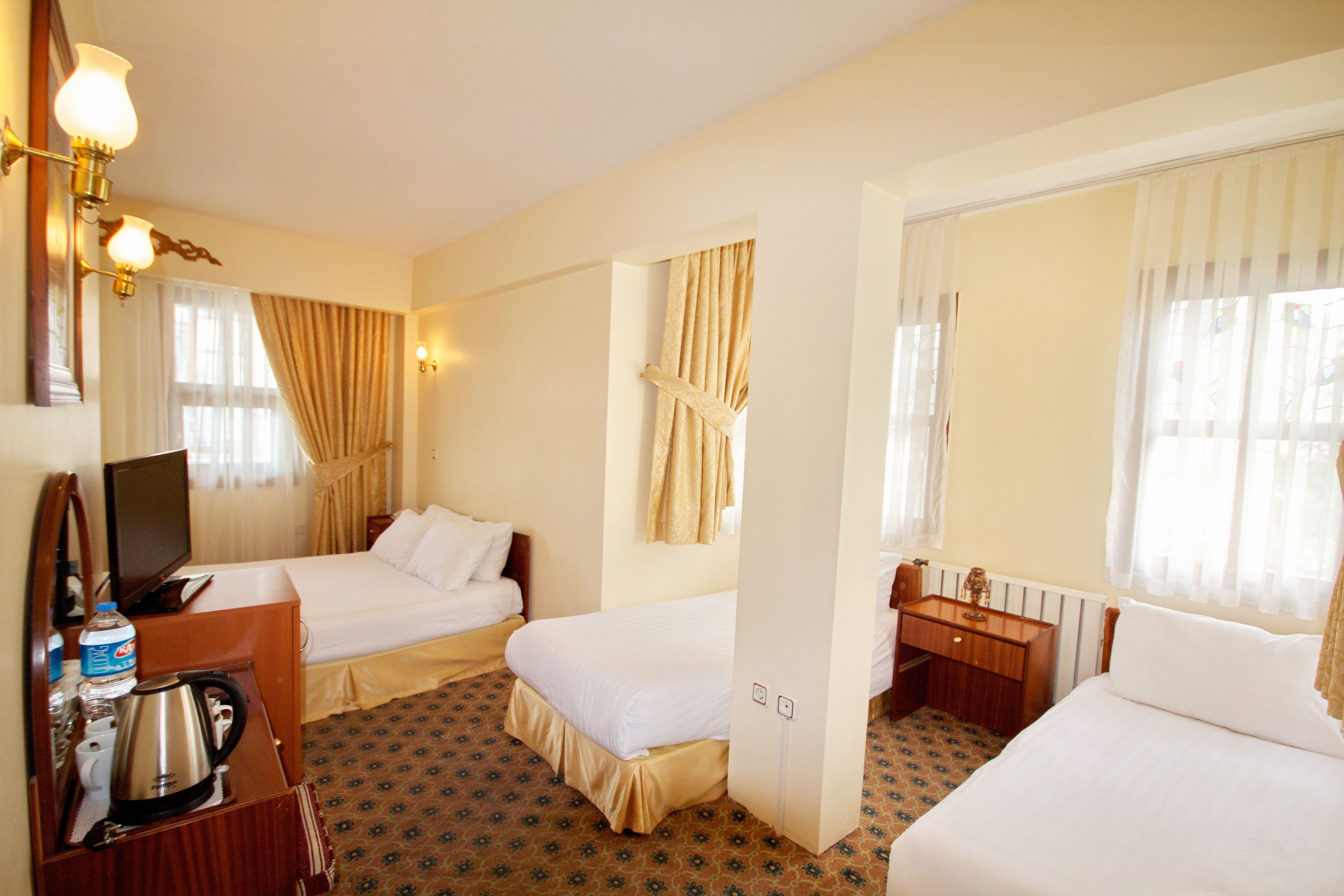 family room | premium bedding, minibar, in-room safe, individually decorated