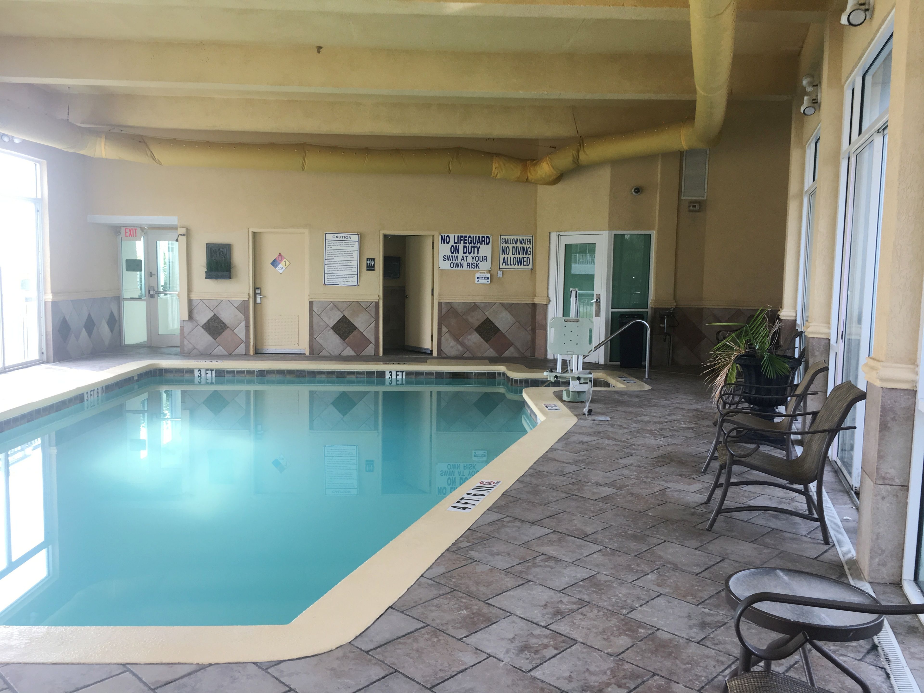 indoor pool, outdoor pool, open 9:00 am to 10:00 pm, pool umbrellas