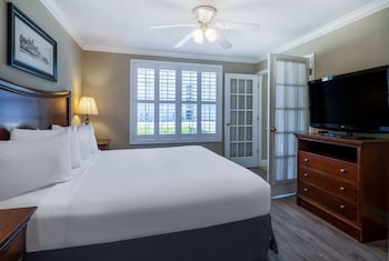 Cottage, 3 Bedrooms, Non Smoking (1 Queen & 2 King Beds) | In-room safe, desk, laptop workspace, iron/ironing board at The Sandbar Hotel, Trademark Collection by Wyndham