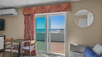 Suite, 1 King Bed, Non Smoking, Ocean View (Romantic, Balcony) | Desk, laptop workspace, iron/ironing board, free WiFi
