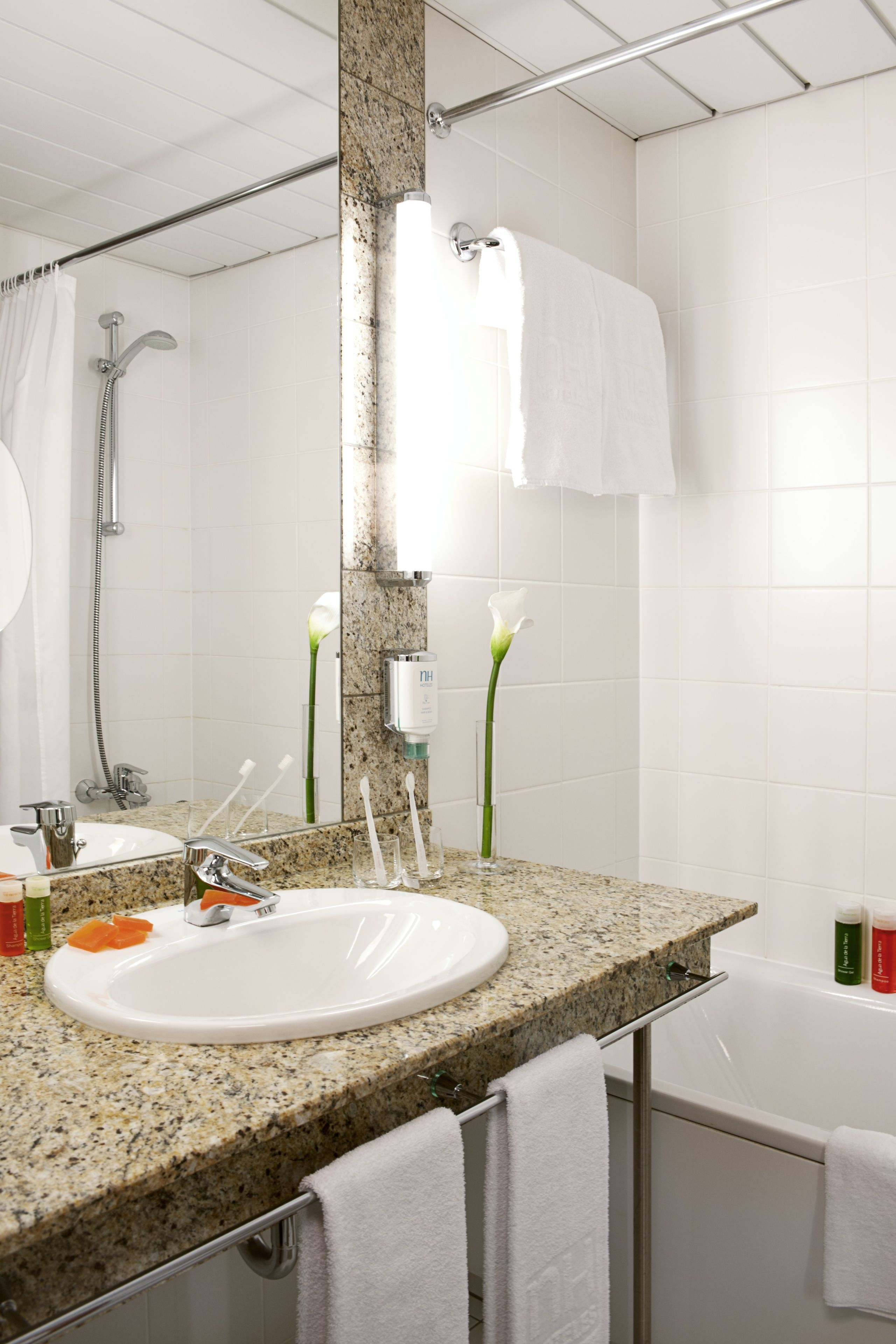 combined shower/bathtub, deep-soaking bathtub, designer toiletries