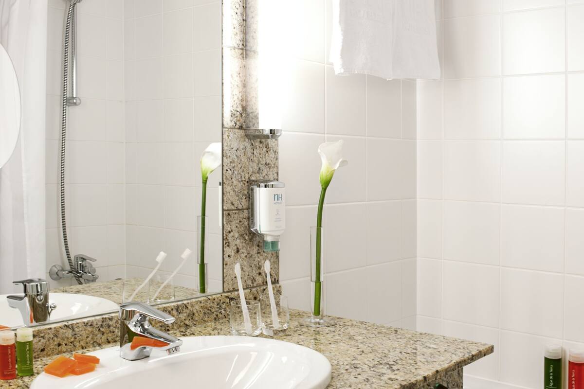 combined shower/bathtub, deep-soaking bathtub, designer toiletries