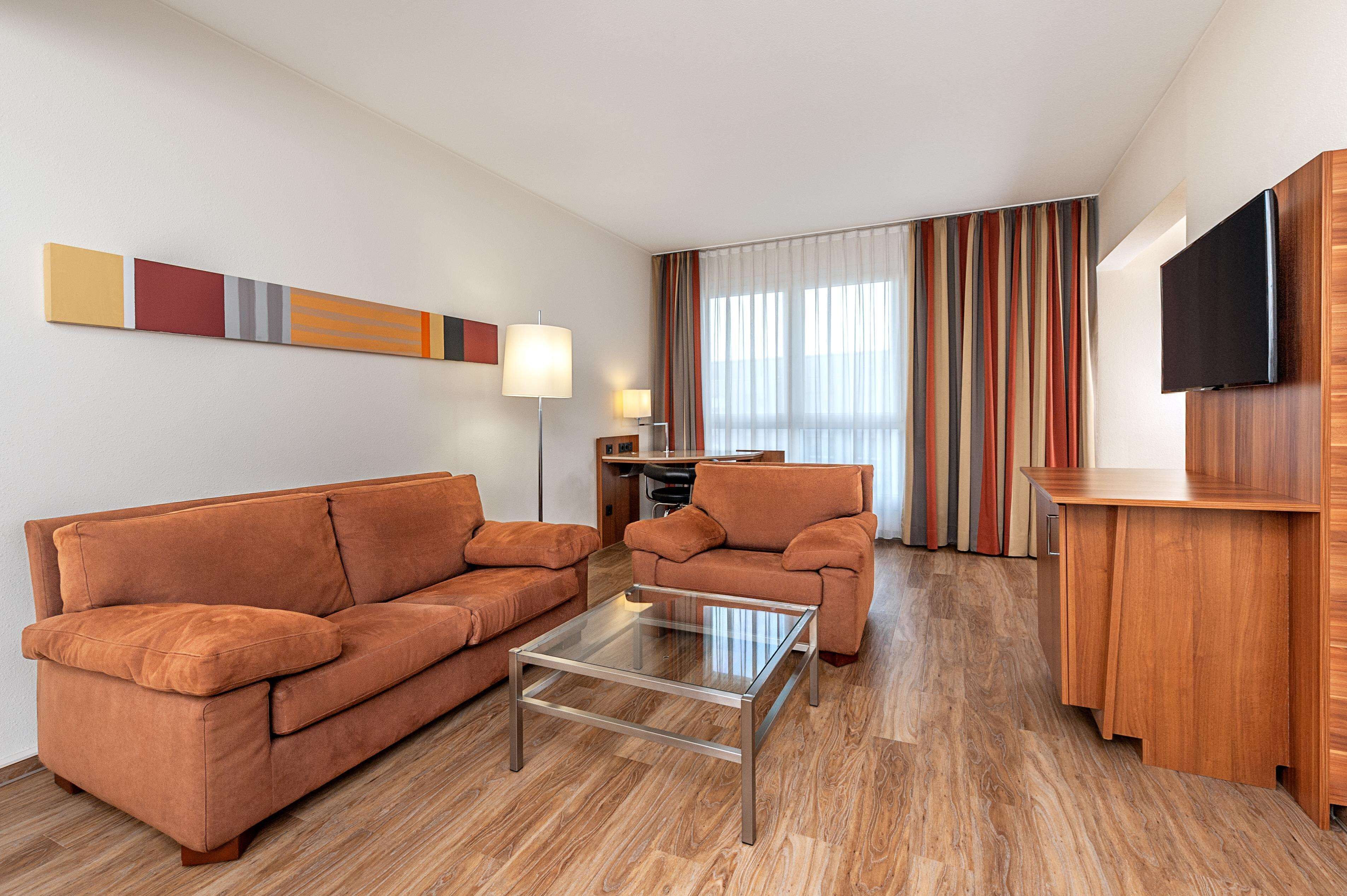 suite | premium bedding, pillow-top beds, minibar, in-room safe