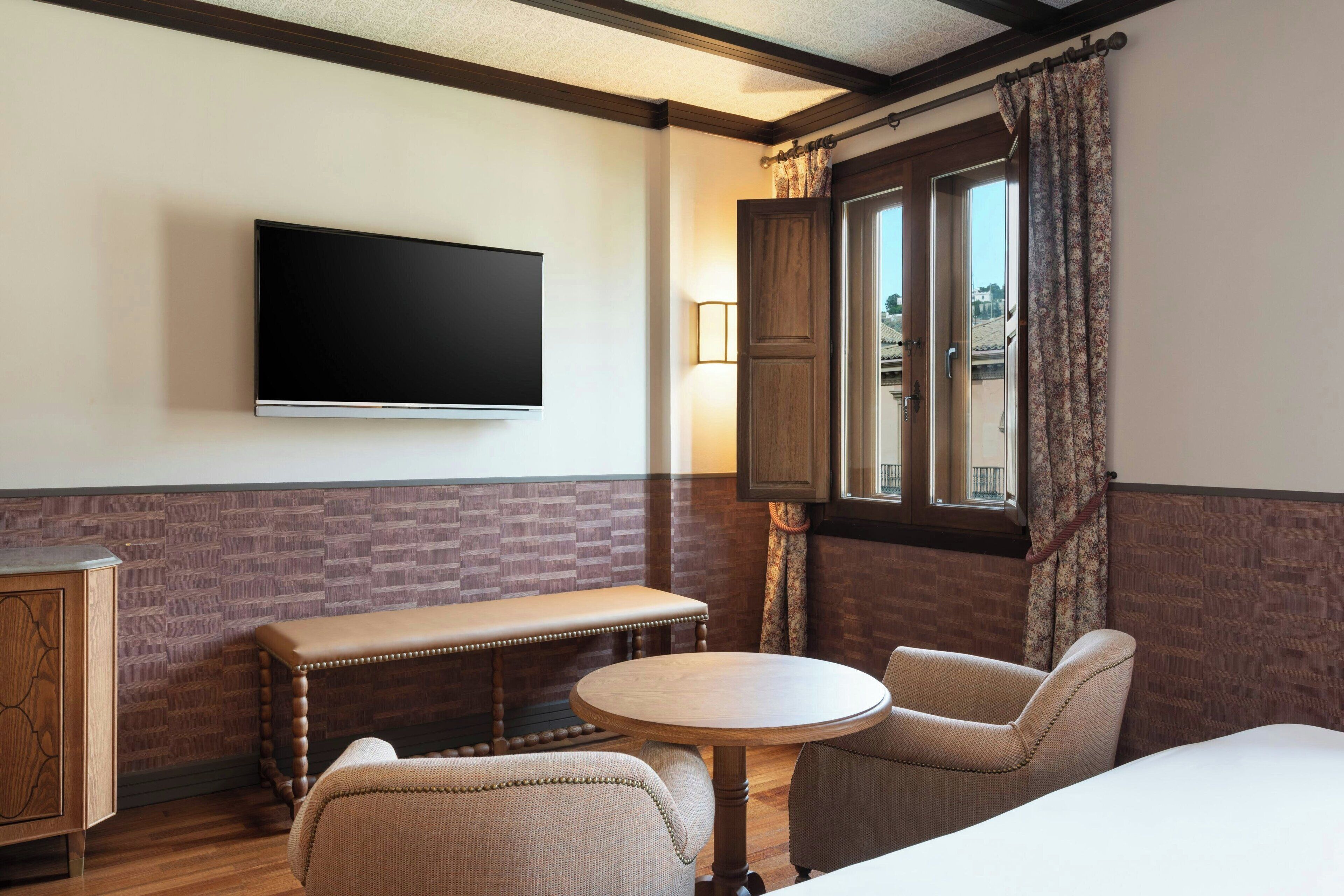 deluxe room, 1 king bed, non smoking (view) | minibar, individually decorated, desk, laptop workspace