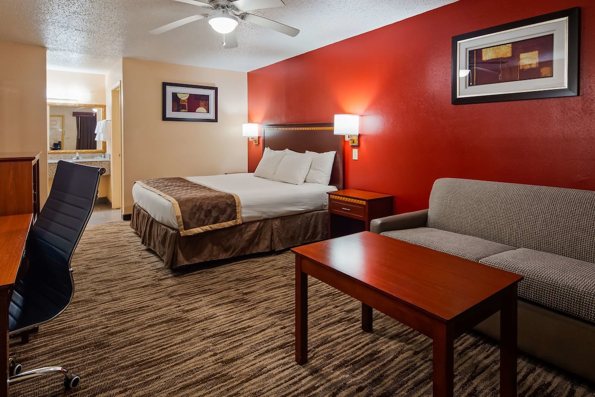 pillow-top beds, desk, laptop workspace, blackout curtains