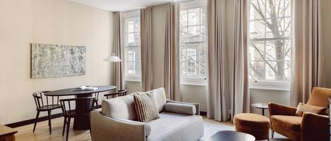 Two Bedroom Apartment | Living area | 43-inch flat-screen TV with cable channels, TV, streaming services