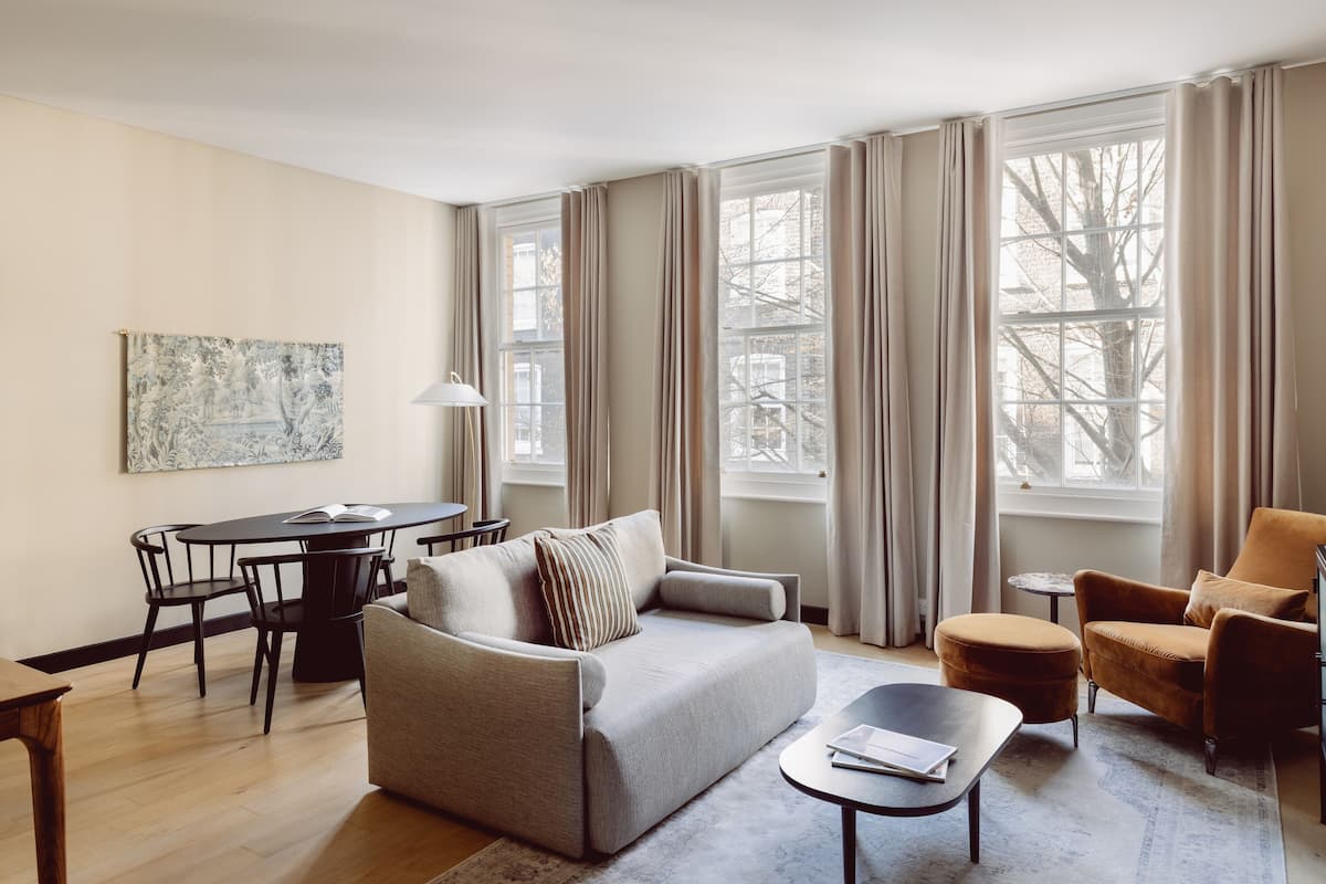 Three Bedroom Apartment | Living area | 43-inch flat-screen TV with cable channels, TV, streaming services