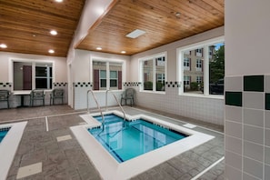 Indoor pool, open 6:00 AM to 10:00 PM, pool loungers