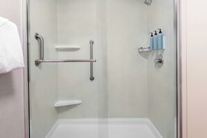 Designer toiletries, hair dryer, towels